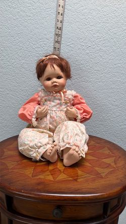 Porcelain Baby Doll with Floral Outfit