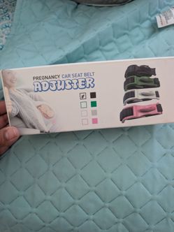 Pregnancy seat belt adjuster