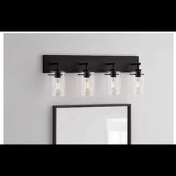 Hampton Bay Regan 29.25 in 4-Light Matte Black Bathroom Vanity Light DSHD19574V3