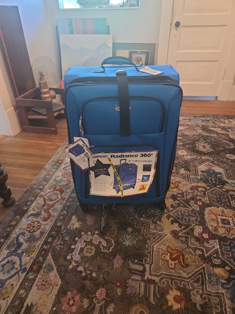 BRAND NEW LUGGAGE