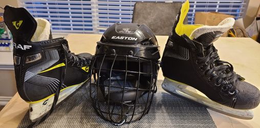 Black Hockey Helmet (Youth 5 -6 1/2) and Ice Hocley Skates size 3.5