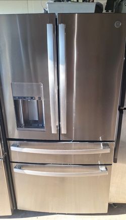 Ge 4 door refrigerator  stainless steel