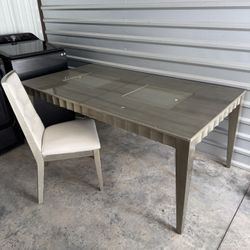 Dining room table with 4 chairs.