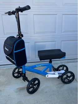KNEE Scooter.  Plush Seat pad, left /ride side Brake Handles. 300lb. Weight Limit. Like new