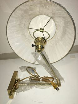 Swing arm wall lamp.
