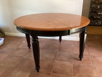 Round Wood Dining Table with Black Legs