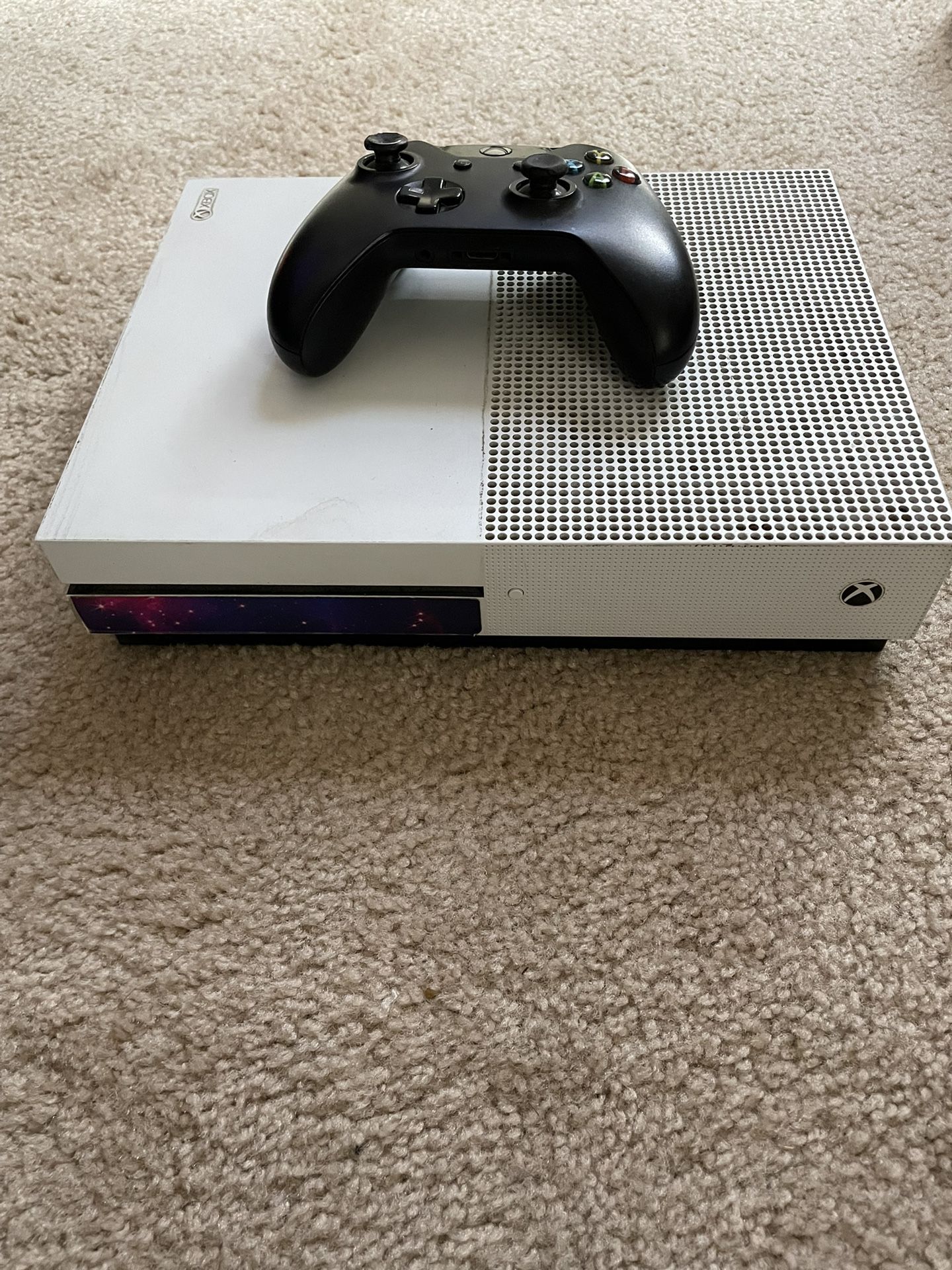 Xbox One and Controller with games
