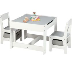 Desk With Chairs And Chalkboard. 