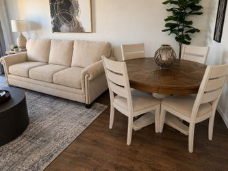 Four chair dining table set and three seat sofa couch