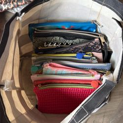 Bag full of assorted make up bags