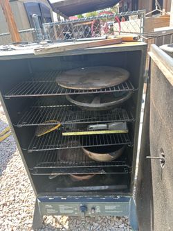 Propane smoker used with wood chips