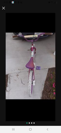 Medium size girl bike pink and white....
