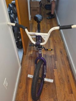 Mongoose purple BMX bike