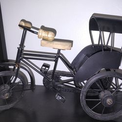 Doll On A Bench And Bicycle 