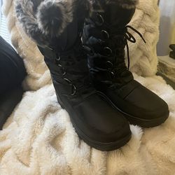 Snow boots, water-repellent, women's sizes $35 each. Sizes available: 6-7-8-9-10-11