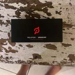 Peloton x Urbanears Sumpan in-ear headphones. Compact wired earbuds designed to stay secure during workouts and exercise.