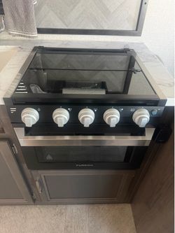 Furrion® - Gama de gas de vidrio de 3 quemadores