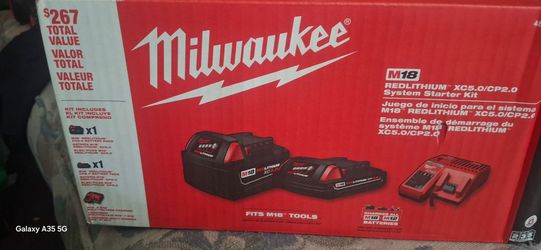Milwaukee battery kit 5.0 and 2.0 and charger