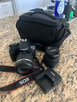 Canon T100 Rebel wth 2 lenses