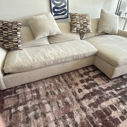 Cream-colored Sectional Couch