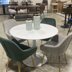 Set Of Four Chairs And White Table
