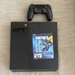 PS4 with Controller and Fortnite Chaos Bundle Voucher