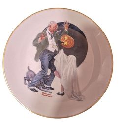 Add a taste of vintage Halloween charm to your collection with this fine porcelain collector’s plate featuring Norman Rockwell’s “Trick or Treat.” Pro