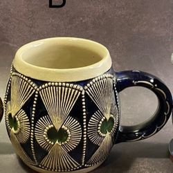 Gorgeous Vintage German ceramic beer stein, often featuring cobalt blue glaze and intricate relief patterns. Ceramic/Stoneware with decorative glaze. 
