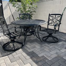 Patio Table w/ 3 Swivel Chairs 