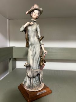 Armani lady figure with greyhound dog