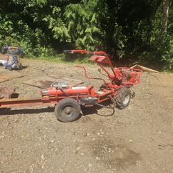 Troy Bilt Horse Tiller With Wood Splitter And Multiple Other Attachments 