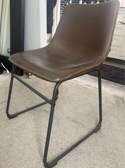 Dark brown faux leather chair