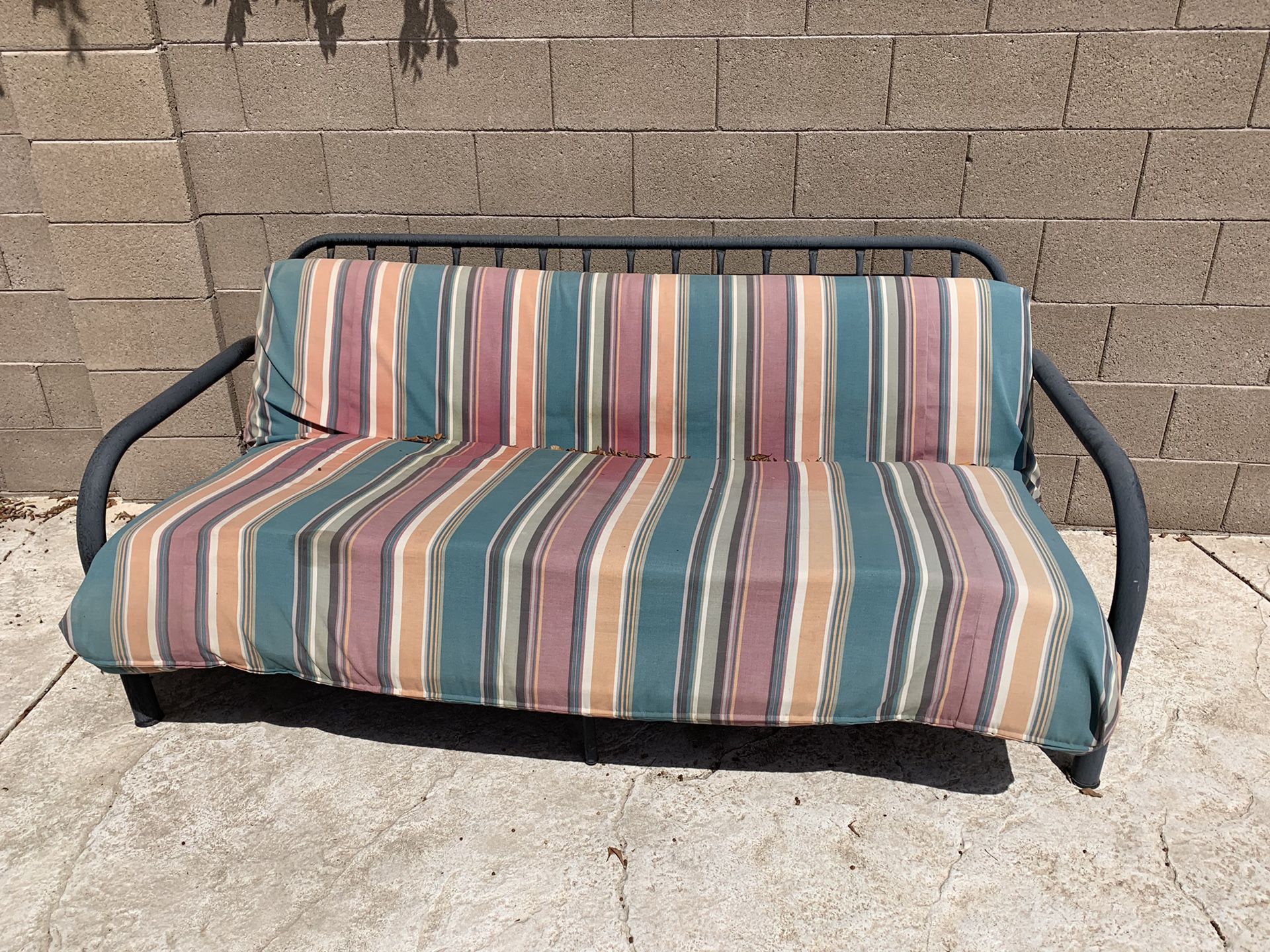 Futon with frame and cushion (kept on patio)
