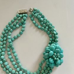 Turquoise Beaded Necklace with Floral Accent and silver clasp. 