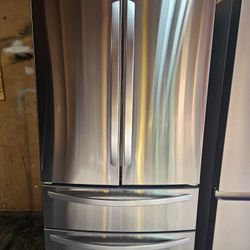 REFRIGERATOR 4 DOOR LG STAINLESS STEEL LIKE NEW  
