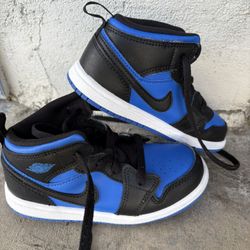 Kids Blue And Black Nike Shoes