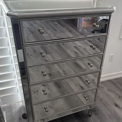 Tall glass / mirrored dresser