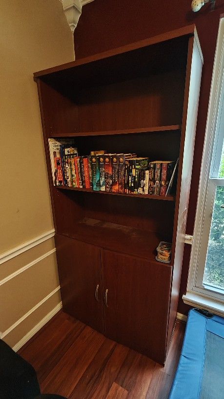 Two Wooden Bookshelves with Cabinets