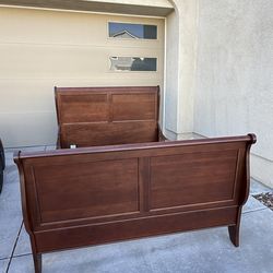 Queen sleigh bed (no mattress included)