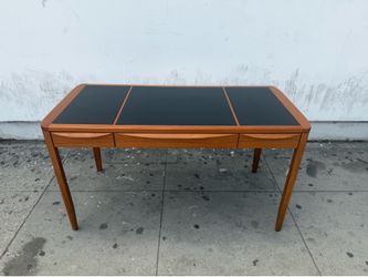 Mid century teak inlaid black top desk by Sun cabinet
