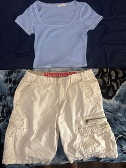blue shirt with white jorts