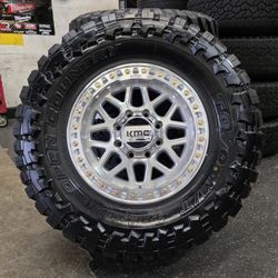 18" KMC rims w- 35" Toyo MT Open Country