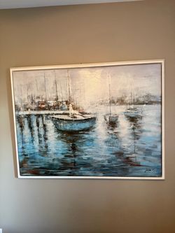 Various large art wall hangings framed