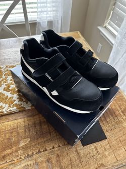 Selling a pair of Leather Reebok work shoes for men They are size 14 and I wore them once. They come in box and I wore them once inside the house. In 