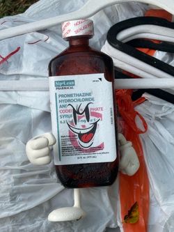 Sip Lean Pharmacal Collectible Bottle Figure