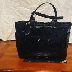 Shiny black Coach Purse, Silver Accent 
