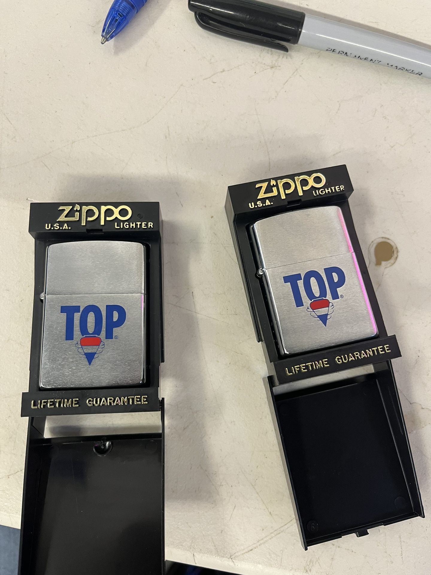 Two Zippo (Top) new lighters