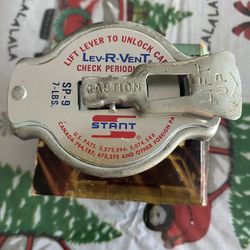 Lift Lever To U lo k Cap