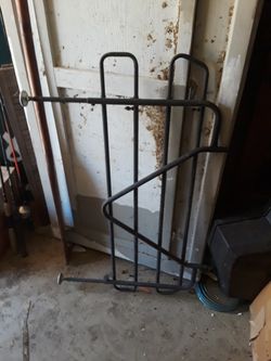 Adjustable fence for SUV keep dogs in back of car