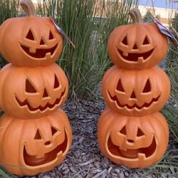 Two matching topiary pumpkins 